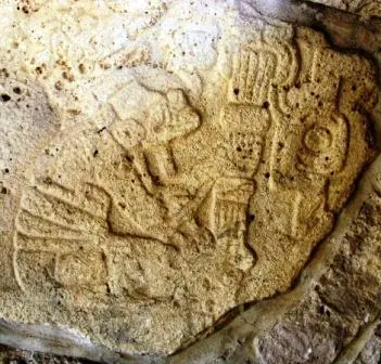 Un des possibles dieux ou prêtres de la galerie des joueurs de balle de Dainzú, Oaxaca, Mexique